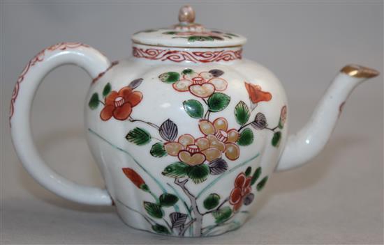 A rare Arita quatre-lobed small teapot and cover, late 17th century, 8.2cm, firing crack to body